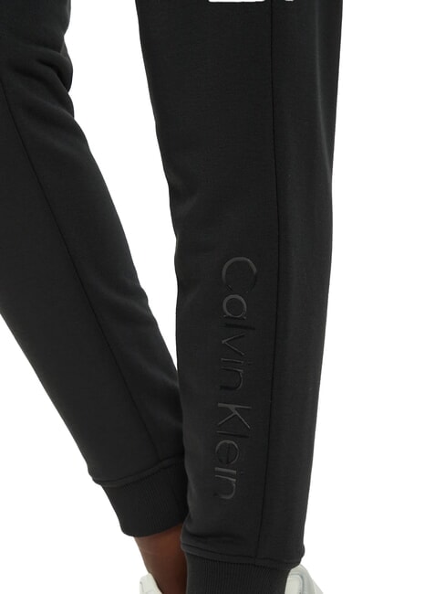 CK PERFORMANCE Pantaloni de trening cu elastic la gleznă frumusețe neagră - Costume sport pentru femei