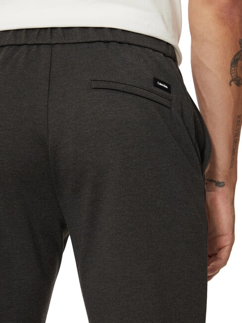 CK Pantaloni slim fit cu talie elastică gri închis heather - Pantaloni